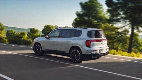 Silver Mercedes Benz GLB Electric driving rear angle