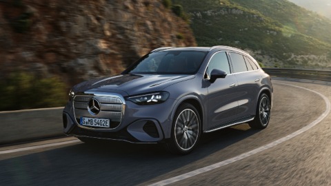 Grey Mercedes GLC Electric driving mountain road