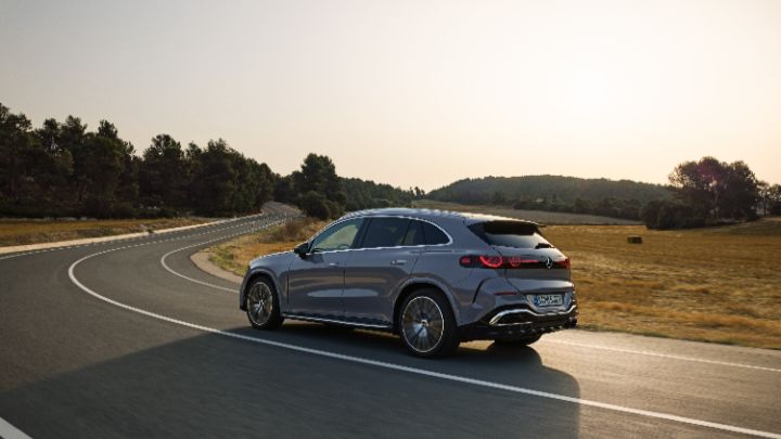 Grey Mercedes Benz GLC driving along country road