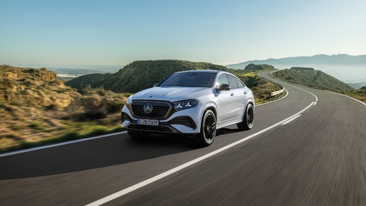 Mercedes-Benz GLE Coupe white driving front right mountain road