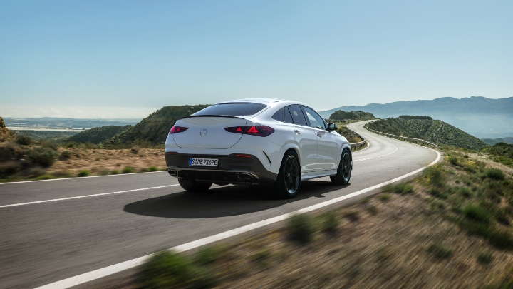 Mercedes-Benz GLE Coupe white driving rear