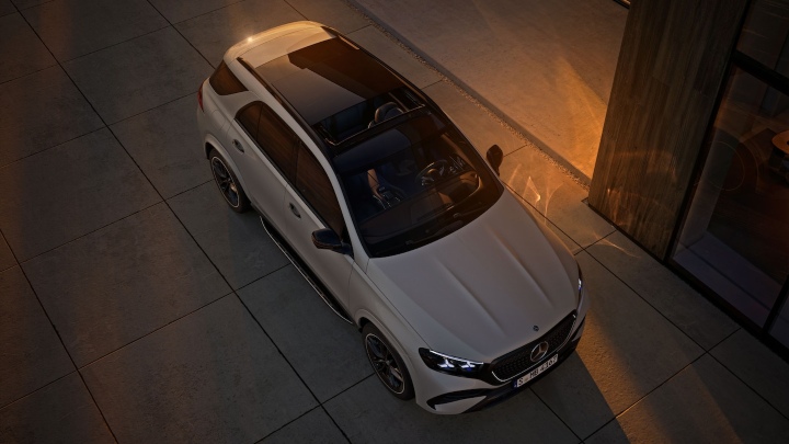 Mercedes-Benz GLE PHEV front aerial white at sunset