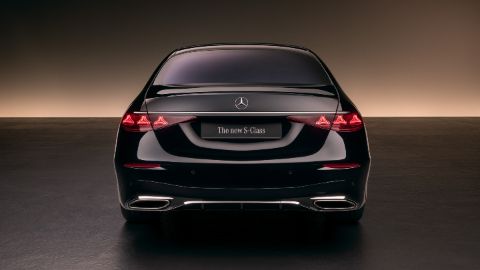 Black Mercedes-Benz S-Class dark background rear angle straight on