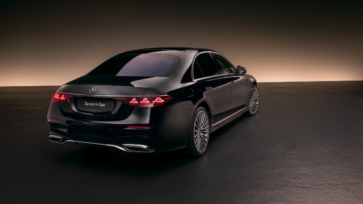 Black Mercedes-Benz S-Class dark background rear angle