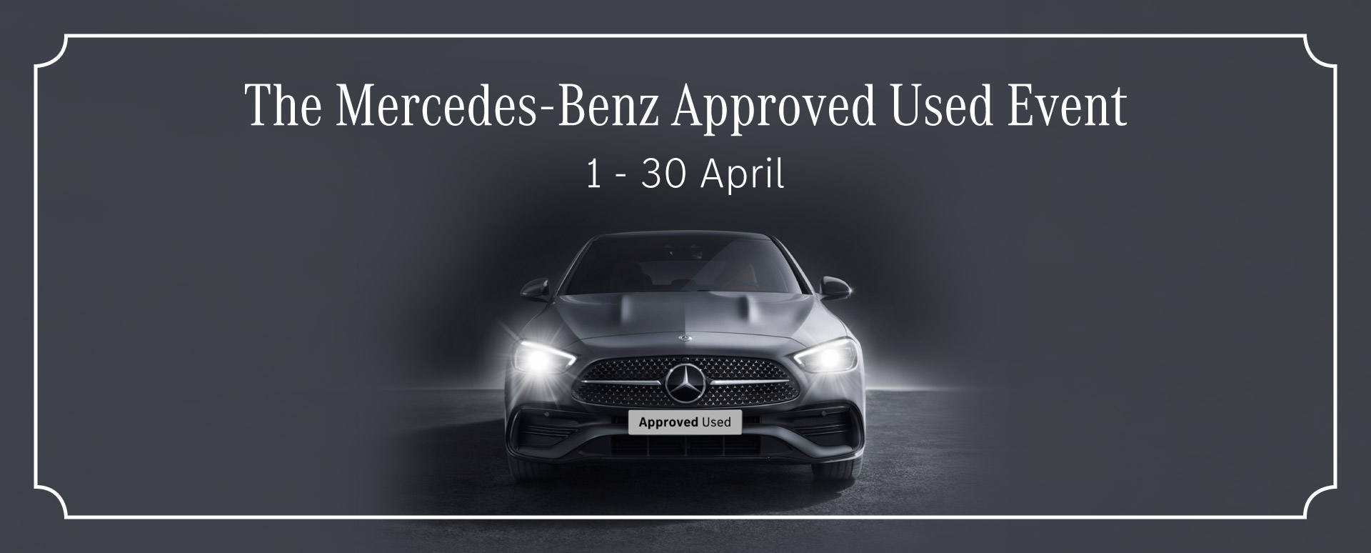 Grey Mercedes-Benz car with headlights on. Promotional text overlay.