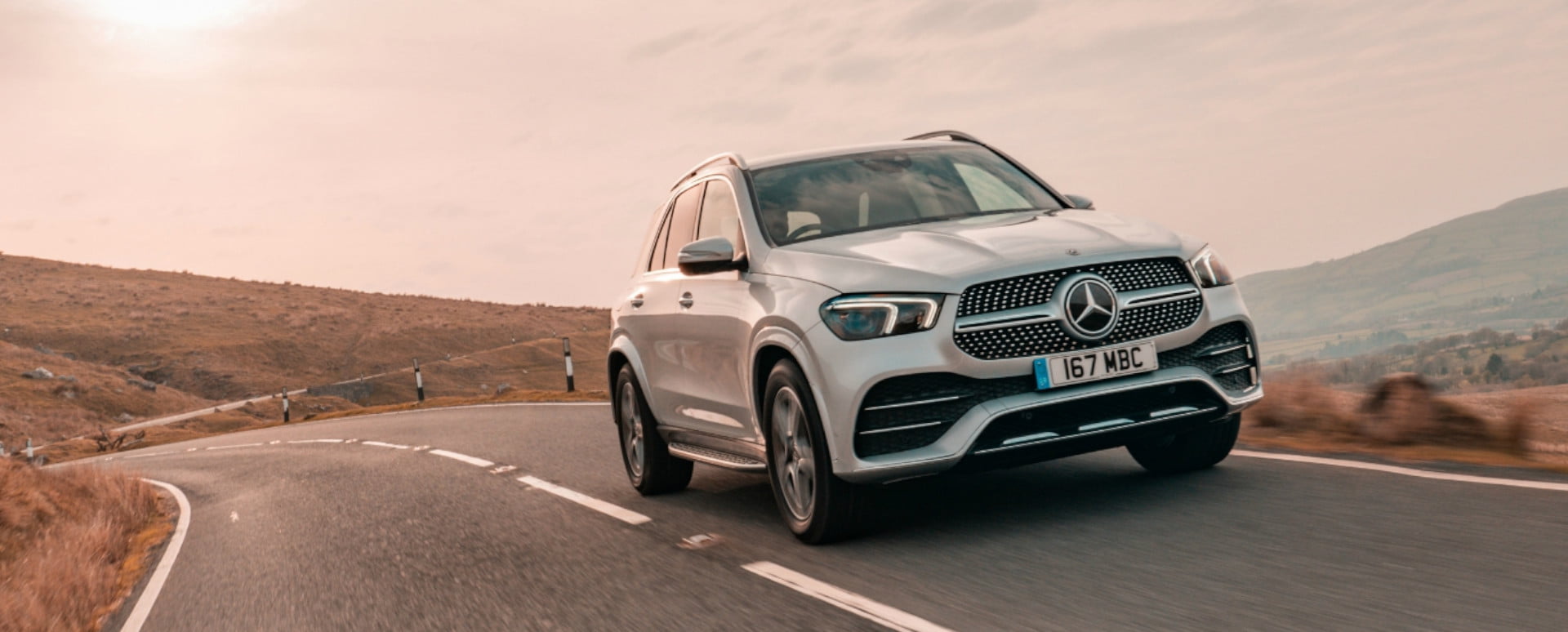 White Mercedes-Benz GLE Driving