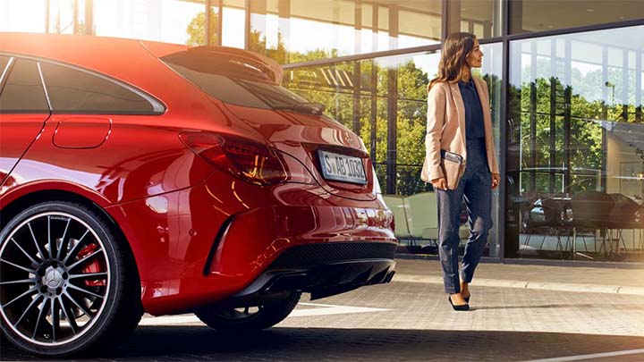 customer dropping off mercedes-benz cla at dealership