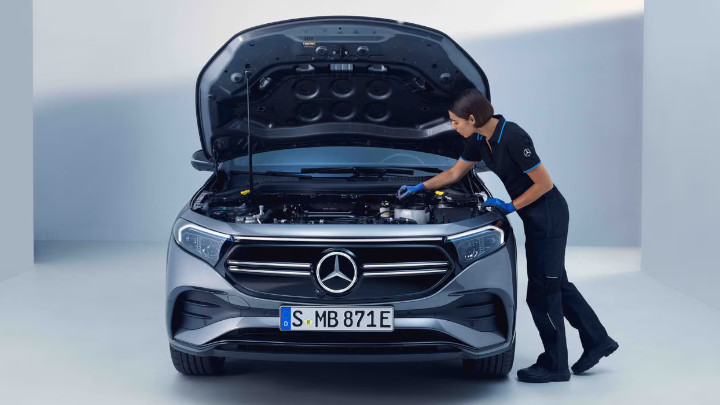Technician Servicing Mercedes-Benz