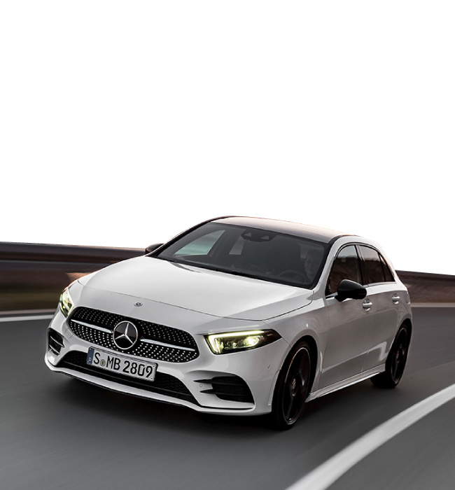 White Mercedes-Benz A-Class driving on the road
