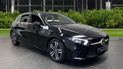 Black Mercedes-Benz A-Class Sport parked in front of a dealership