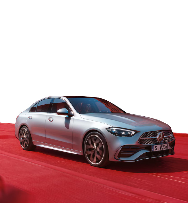 Silver Mercedes-Benz C-Class parked on a red carpet