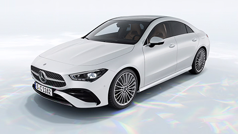 White Mercedes-Benz CLA parked in front of a white background