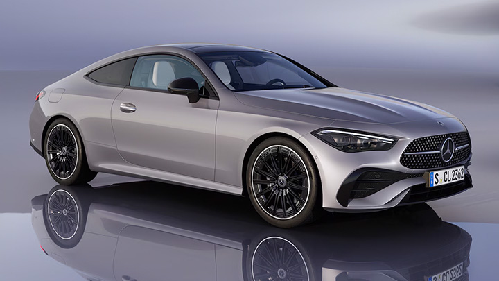 Silver Mercedes-Benz CLE parked in front of a grey background