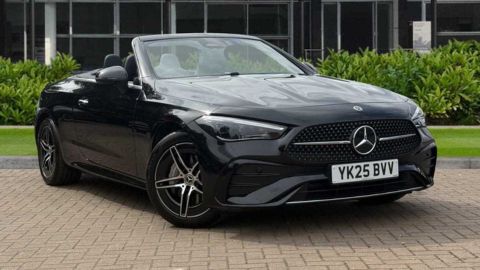 Black Mercedes-Benz CLE AMG Line parked in front of a dealership