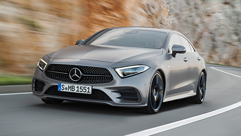 Grey Mercedes-Benz CLS driving on the mountain