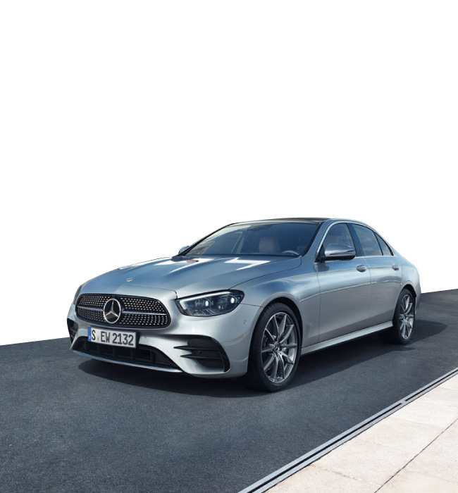 Black Mercedes-Benz driving on the road