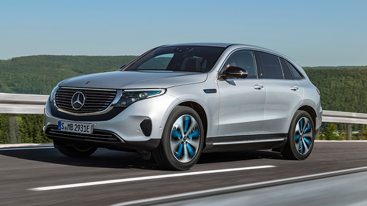 Silver Mercedes-Benz EQC driving on the road