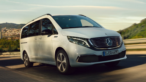 White Mercedes-Benz EQV driving on the road