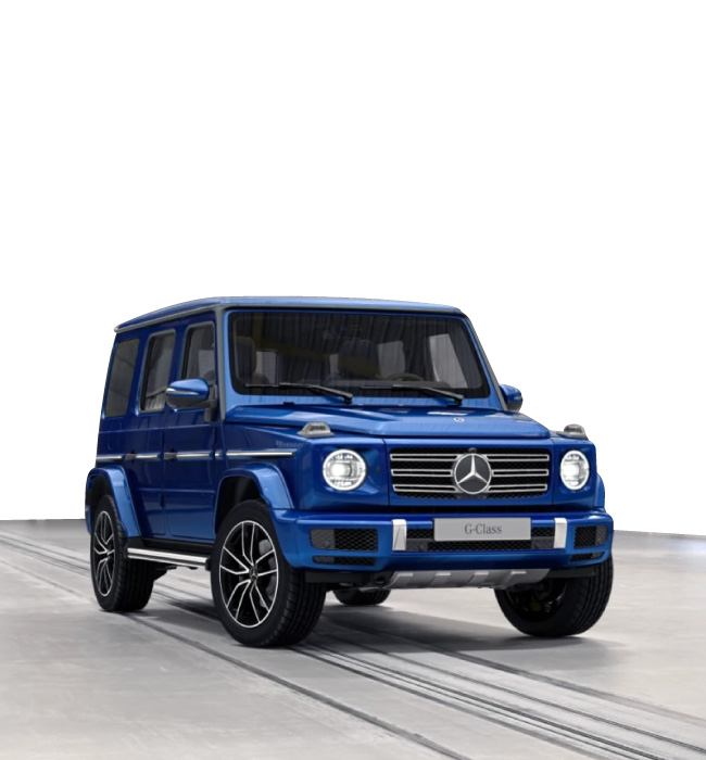 blue Mercedes-Benz G-Class driving on the road