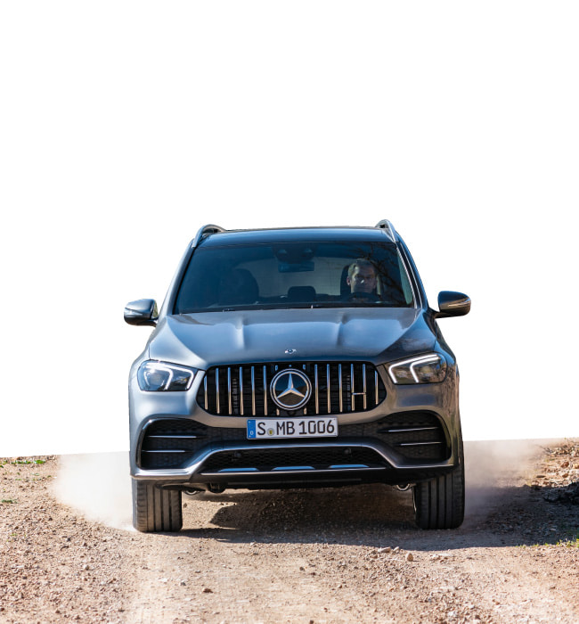 Silver Mercedes-Benz GLE SUV Exterior Front Driving Off-Road