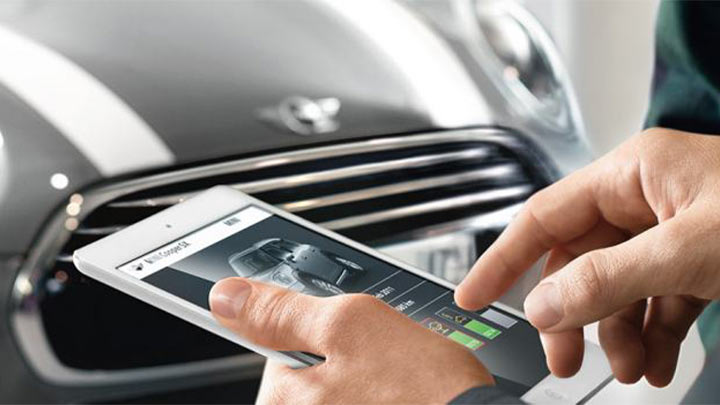 technician holding tablet