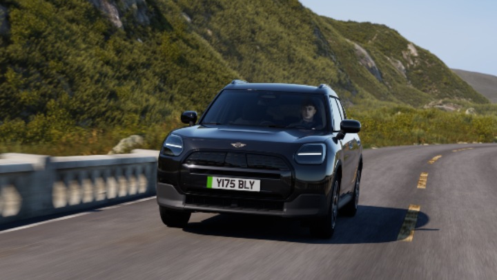 Black MINI Countryman Electric Exterior Driving in Mountain Valley