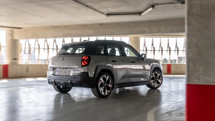 Grey Mini Aceman rear driving