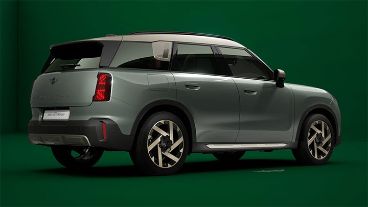 Grey MINI Countryman Rear Quarter with Green Background