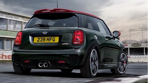 Green MINI Hatch John Cooper Works, rear shot, driving on track