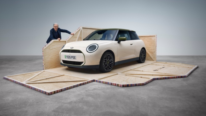 MINI Cooper revealed during Paul Smith unboxing installation in studio setting