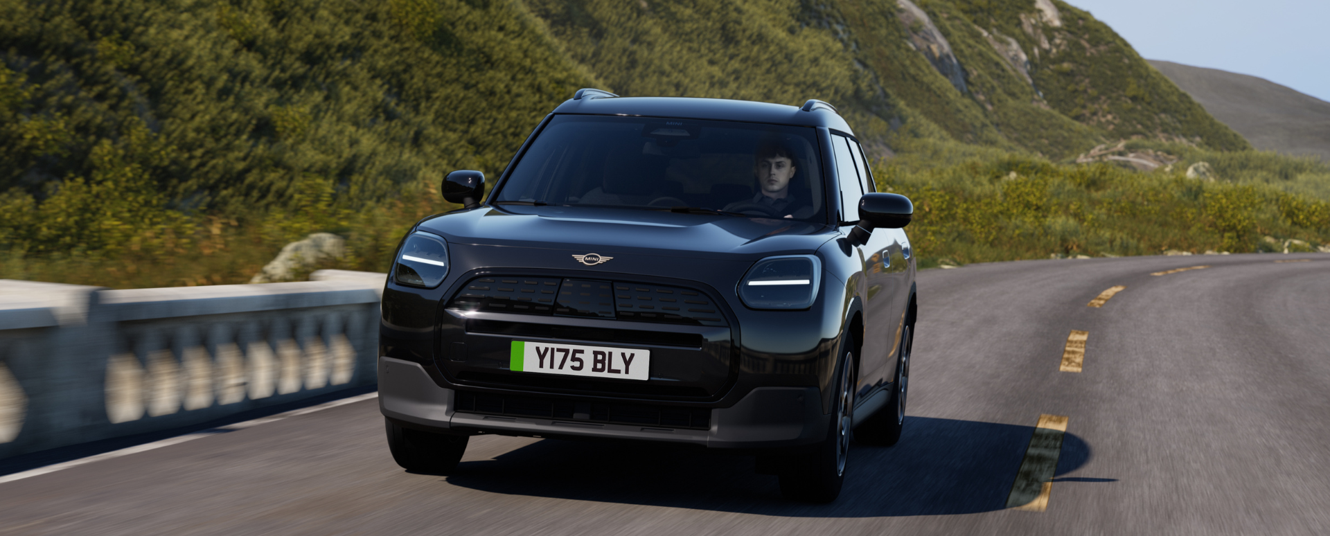Black MINI Countryman Driving on Road