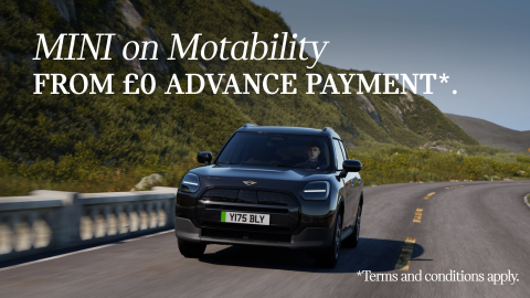 Black MINI Countryman Driving on Road