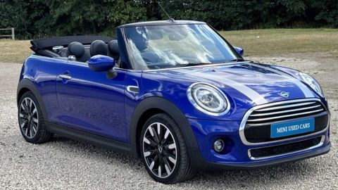 Blue MINI Cooper Exclusive parked in a car park