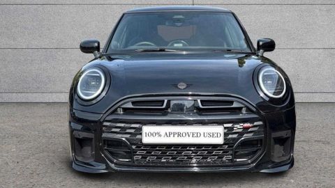 Black MINI Cooper S Sport parked in front of a grey wall