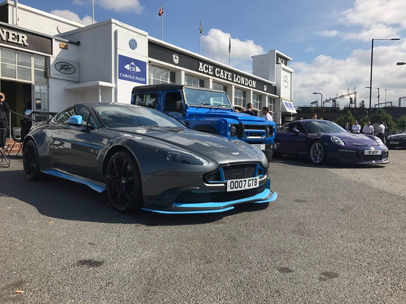 aston martin vantage, land rover defender and porsche 911