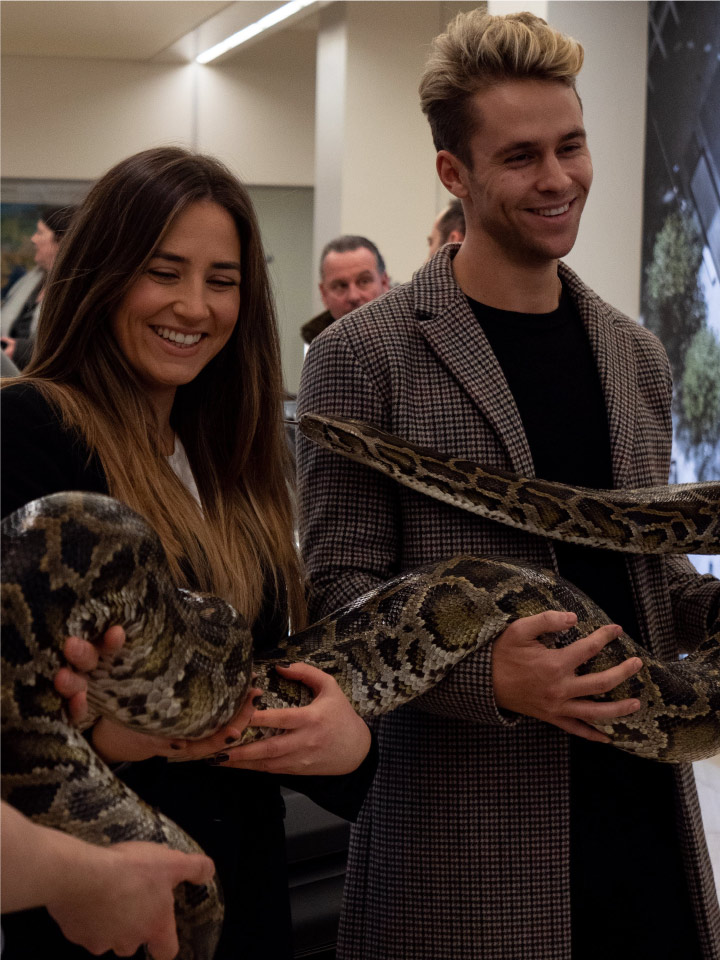 Influencer holding a python