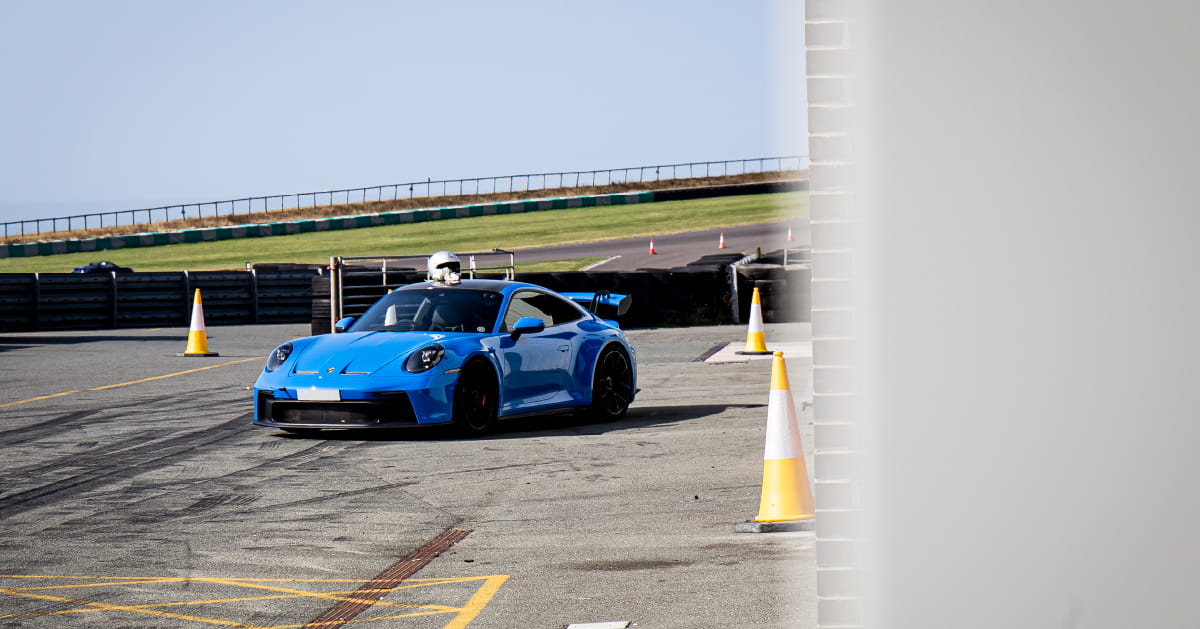 Blue Porsche 911 Pit Lane