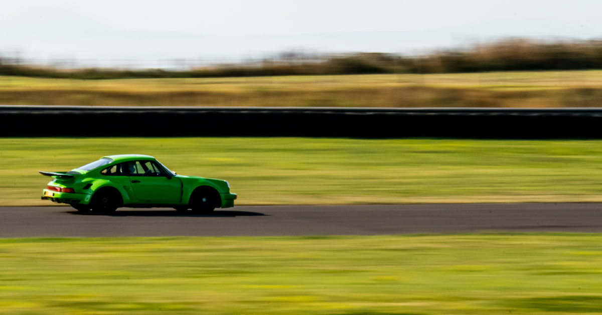 Green Porsche 911 RSR Driving Side