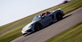 Silver Porsche Cayman Spyder Driving