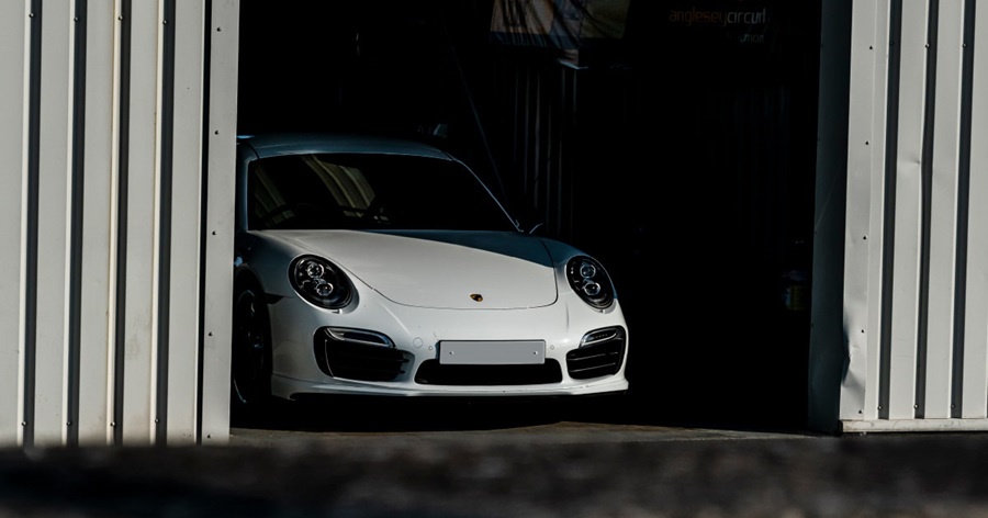 White Porsche 911 In Pit Box