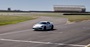 White Porsche Cayman GT4 Driving