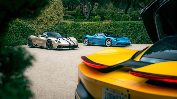 A range of Pininfarina Battista models parked in a car park