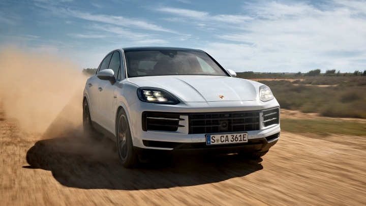 White Porsche Cayenne Exterior Front Driving Off-Road