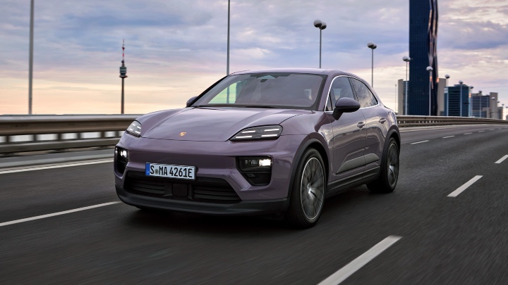 Porsche Macan lilac purple colour driving on road