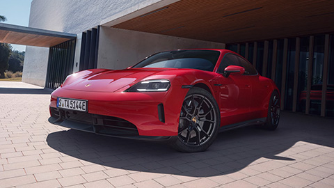 Red Porsche 911 Parked Outside Home