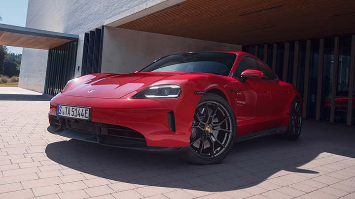 Red Porsche 911 Parked Outside Home