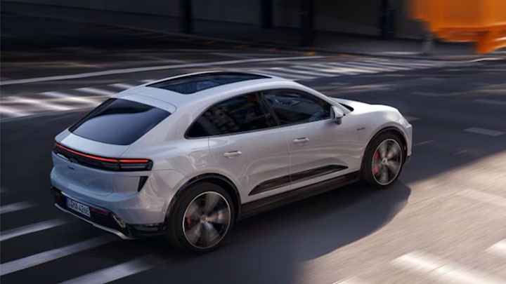 White Porsche Panamera Rear Driving