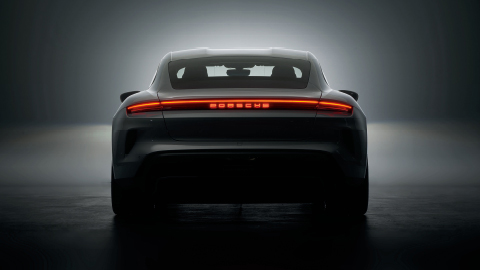 Silhouetted Rear Shot of Porsche Vehicle 
