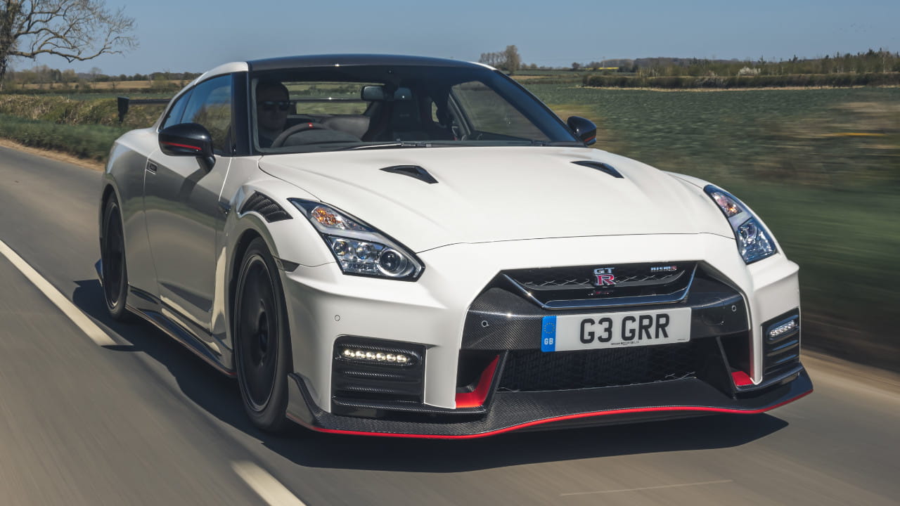 White Nissan GT-R NISMO Exterior Front Driving