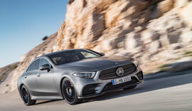 Grey Mercedes-Benz CLS 2018 driving on the road.